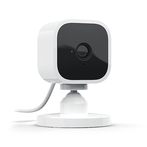 Blink Mini compact indoor plug-in smart security camera in white.